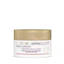 Embalagem topo pote do Creme redutor de olheiras da linha Neo Dermo da Eudora. Embalagem branca, redonda com tampa de rosquear dourada, rótulo em tons dourados no fundo branco com informações sobre a redução visível da intensidade das olheiras.