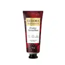 Creme perfumado para mãos da linha Instance da Eudora, com embalagem de 30g em tubo plástico vermelho escuro, destacando o nome da marca e o produto "Frutas Vermelhas" em letras brancas e douradas.