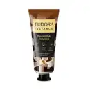 Embalagem de creme perfumado para mãos da marca Eudora Instance, com rótulo amarelo e preto destacando a fragrância "Baunilha Intensa". O produto contém glicerina vegetal e é livre de parabenos.