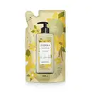 A imagem mostra embalagem refil do creme hidratante corporal da marca Eudora, linha Instance, fragrância Baunilha. Frasco de plástico com o produto, com ilustrações de flores e favas de baunilha. Capacidade de 350ml.