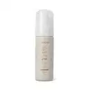 Frasco de espuma de banho cremosa de Eudora da linha Little Secrets da Eudora, com embalagem branca e detalhes em cores pastel, contendo 150 ml do produto.