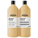 Dois frascos de shampoo e condicionador da linha Absolut Repair da L'Oréal Professionnel, com embalagens em tons de bege e preto, contendo informações sobre os produtos na frente.