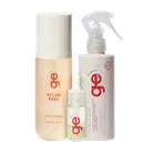 Conjunto GE Beauty com três produtos: frasco cilíndrico branco com líquido bege "Melon Mood" (200ml), frasco pequeno translúcido e frasco spray branco com líquido rosado (200ml). Embalagens com logo vermelho "ge" e textos em branco.