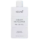 Frasco branco da marca Keune, contendo Cream Developer com 9% - 30 VOL. O rótulo apresenta o nome da marca e do produto em letras pretas.