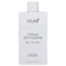 Frasco branco da marca Keune, contendo Cream Developer com 3% - 10 VOL. O rótulo apresenta o nome da marca e do produto em letras pretas.