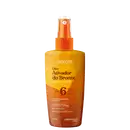 O produto mostrado é um óleo ativador do bronze da marca Labotrat. A embalagem é um frasco de plástico de cor amarela e laranja, com um rótulo que indica o nome do produto "Óleo Ativador do Bronze" e algumas informações sobre seus benefícios.