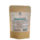 A imagem mostra um pacote da Argila Dourada de Oleoterapia Brasil. É um pacote de papel kraft com uma etiqueta impressa contendo informações sobre o produto. O pacote tem 50g de conteúdo.