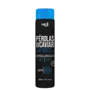 Frasco preto e azul da linha Widi Care, contendo shampoo anti-resíduos de pérolas de caviar. Destaca-se o texto "Pérolas de Caviar" e informações sobre a fórmula livre de sulfatos, parabenos e silicones.