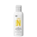 Produto de cuidado capilar Curly Care, embalagem plástica branca opaca com tampa. Rótulo frontal com coroa amarela e texto "Nutrição" em letras grandes. Descrição em português "Mix Antiporosidade aveia & semente de uva, óleo capilar".