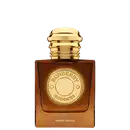 Perfume Burberry Goddess Amber Vanilla em frasco quadrado âmbar com tampa dourada. Rótulo circular dourado com inscrição "Burberry Goddess" e texto "Amber Vanilla" na base. Design luxuoso e elegante.