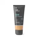 Bisnaga cinza escura com faixa bege de base líquida da marca Quem Disse, Berenice? com acabamento soft mate, com texto em destaque na cor azul indicando "tint alta cobertura".