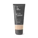 Bisnaga cinza de base líquida da marca Tô no Glow Quem disse, Berenice?, com detalhe na cor da base na parte inferior da embalagem e texto branco branco no rótulo.