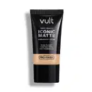 Base líquida Iconic Matte da Vult, em embalagem preta com detalhes em branco, apresentando informações sobre o acabamento natural e longa duração do produto.