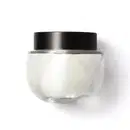 Frasco de vidro arredondado, transparente com tampa preta de rosquear, contendo o creme na cor branca. Design minimalista e elegante.