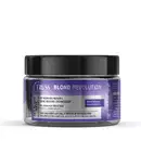 Pote preto de produto Net Mask para cabelos da marca Truss, com rótulo roxo e branco exibindo o nome "Blond Revolution" e informações sobre tecnologia de reparação e redução de quebra.