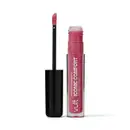 Batom líquido matte Vult Iconic Comfort em embalagem plástica rosa com aplicador preto. O produto apresenta textura cremosa e cor rosa vibrante.