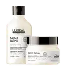Produtos da linha Metal Detox da L'Oréal Professionnel, incluindo um frasco de shampoo e um pote de máscara, ambos com embalagem branca e preta com detalhes em prata.