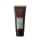 Tubo de creme para barbear da marca Malbec Club, com embalagem marrom e rótulo branco. Possui texto "Sensitive Creme para Barbear" e informações sobre o produto, como peso líquido de 100g e textura que auxilia na definição da barba.