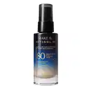 Frasco de vidro cilíndrico em degradê de preto para o azul de base líquida da marca Make B.  Retinol H+. Na parte inferior da embalagem se vê o tom da base. O rótulo contém texto escrito em dourado, com destaque para o FPS 80.