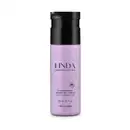 Frasco lilás com tampa e letras pretas contendo 200ml de loção hidratante corporal da marca Linda Irresistível.