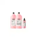 Conjunto de produtos L'Oréal Professionnel da linha Vitamino Color, incluindo shampoo, condicionador e spray em embalagens rosa com rótulos em inglês.