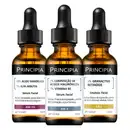 Três frascos de sérum facial da marca Principia, contendo diferentes formulações: AM-10 com ácido mandélico e alfa-arbutina, AH-2 com ácidos hialurônicos e vitamina B5, e GR-2 com retinóide granativo.