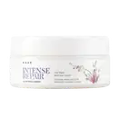 Embalagem branca com rótulo roxo e floral da linha Intense Repair da marca Braé, contendo máscara capilar para reparação e brilho completos dos cabelos.