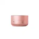 Pote rosa de 200g da linha Aura Beauty, contendo a descrição "Magic Butter Moisturizing Cream" em sua embalagem. O produto apresenta um design minimalista e elegante, com a marca Aura Beauty destacada em letras douradas.