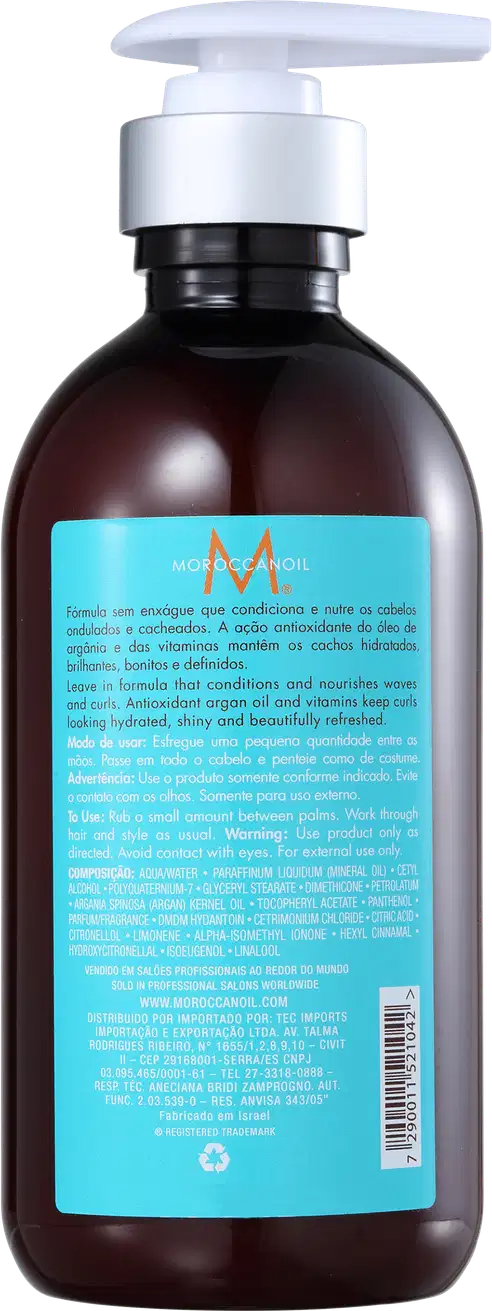 A imagem mostra a parte de trás da embalagem do produto Moroccanoil Intense Curl Cream, frasco plástico marrom escuro com bomba dosadora branca. Rótulo azul turquesa com texto informativo sobre a fórmula hidratante e nutritiva.