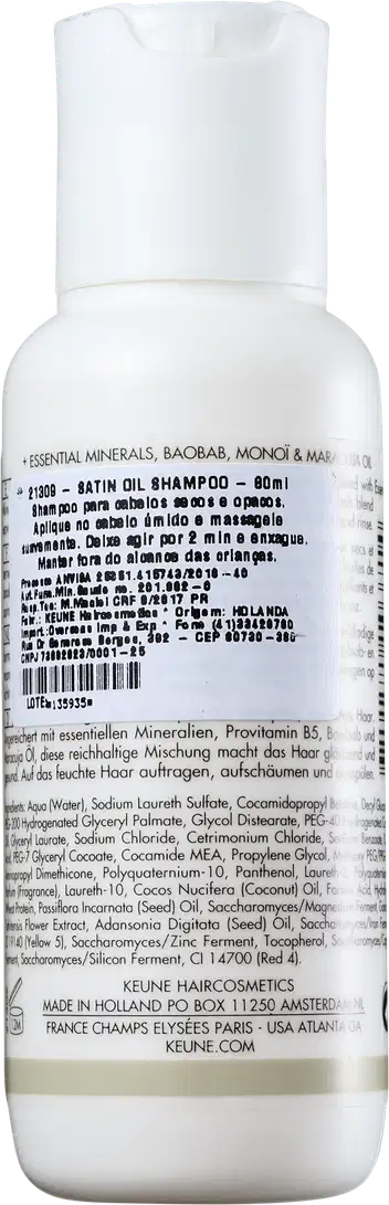 Frasco branco de 80 ml da linha Care da Keune, contendo o Shampoo de Óleo Satinado, com rótulo destacando a luminosidade para cabelos opacos.