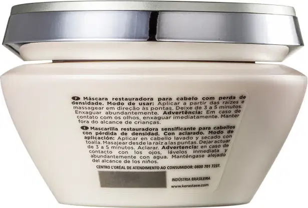 Embalagem branca e prata de máscara capilar Kérastase Densifique, com 200g de produto. Rótulo com nome da marca e informações sobre os ingredientes.
