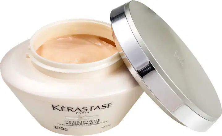 Embalagem branca e prata de máscara capilar Kérastase Densifique, com 200g de produto. Rótulo com nome da marca e informações sobre os ingredientes.