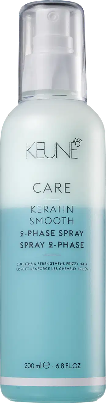 Frasco de spray Keune Care Keratin Smooth, com 200 ml de conteúdo. O produto apresenta uma embalagem de plástico transparente com rótulo azul claro e texto em preto indicando "2-Phase Spray".