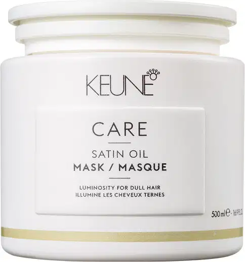 Frasco branco com rótulo da marca Keune, contendo máscara de óleo de seda para cabelos opacos, com informações sobre luminosidade e tratamento para cabelos.