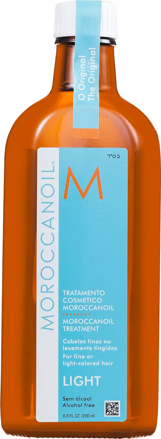 A imagem mostra o Óleo Capilar Moroccanoil Treatment Light 200ml, frasco na cor âmbar com rótulo azul turquesa, com detalhes em branco e laranja. Indica que é um tratamento para cabelos finos ou levemente tingidos.