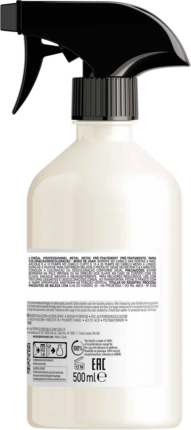 Frasco de spray branco da L'Oréal Professionnel Paris, com rótulo preto e branco, contendo o produto "Metal Detox" com tecnologia patenteada. O frasco possui um gatilho preto para aplicação.