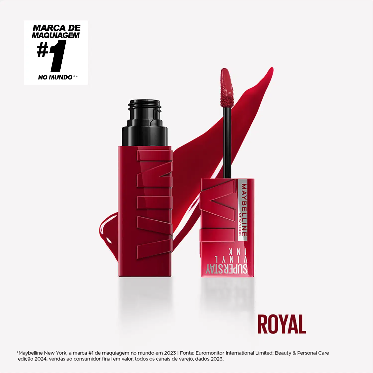 Batom líquido Maybelline Super Stay Vinyl Ink, cor Royal, em tubo vermelho com tampa preta e aplicador de ponta. Textos visíveis: "MAYBELLINE NEW YORK" e "SUPER STAY VINYL INK".