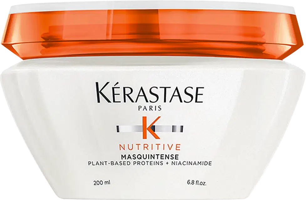 Frasco branco com tampa laranja da linha Nutritive da Kérastase, contendo 200 ml de máscara capilar à base de proteínas vegetais e niacinamida.