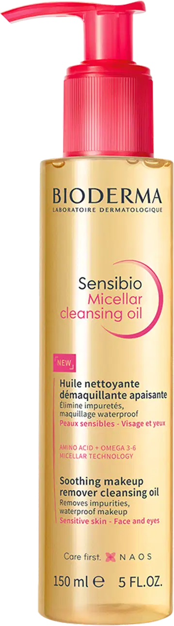 Frasco de óleo de limpeza micelar da marca Bioderma, com bomba doseadora vermelha, rótulo dourado e texto "Sensibio Micellar Cleansing Oil" em destaque.