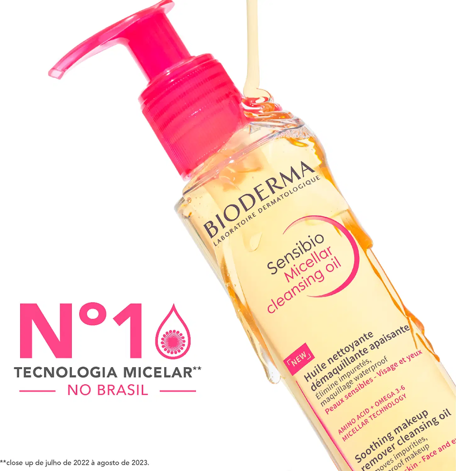 Frasco de item de perfumaria da marca Bioderma com bomba doseadora vermelha, contendo óleo micelar para limpeza da pele, com texto "Sensibio Micellar Cleansing Oil" visível.