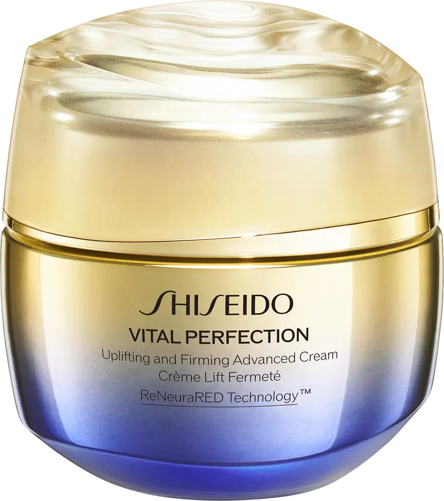 Creme antirrugas e firmador da linha Vital Perfection da Shiseido. Embalagem redonda com tampa dourada. O frasco tem uma coloração azul escura na base que se torna mais clara em direção ao topo.