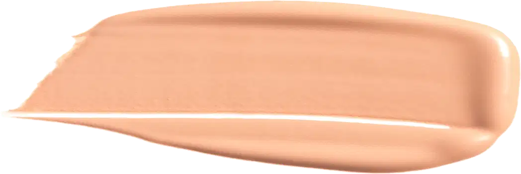 A imagem mostra uma porção de base líquida da marca de maquiagem Wet n Wild, depositada em uma superfície de fundo branco. O produto possui um acabamento brilhante e sedoso, de fácil espalhabilidade.