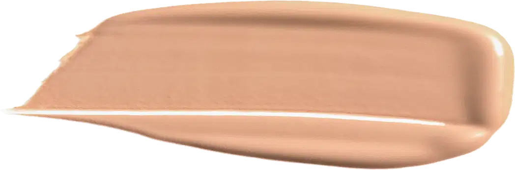 A imagem mostra uma porção de base líquida da marca de maquiagem Wet n Wild, depositada em uma superfície de fundo branco. O produto possui um acabamento brilhante e sedoso, de fácil espalhabilidade.