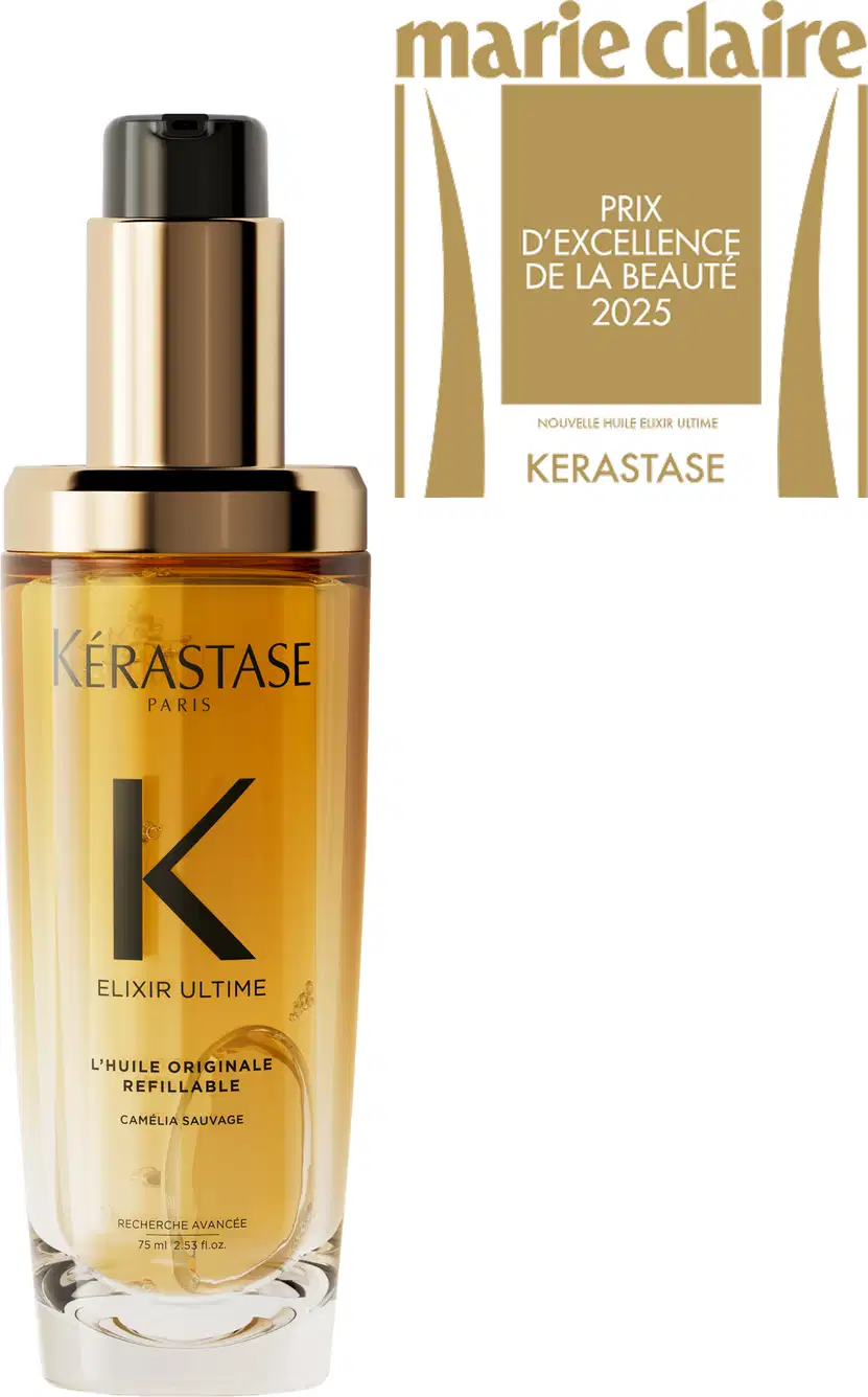Frasco de vidro com líquido dourado, rótulo com a marca Kérastase e texto "Elixir Ultime L'huile Originale Refillable" e "Prix d'excellence de la beauté 2025".