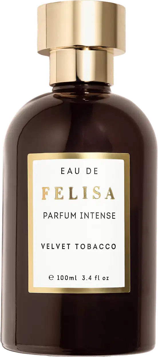Perfume intenso Felisa Velvet Tobacco em frasco de vidro âmbar de 100ml. Embalagem cilíndrica com tampa dourada. Rótulo retangular dourado com texto "Eau de Felisa Parfum Intense Velvet Tobacco" em letras brancas.