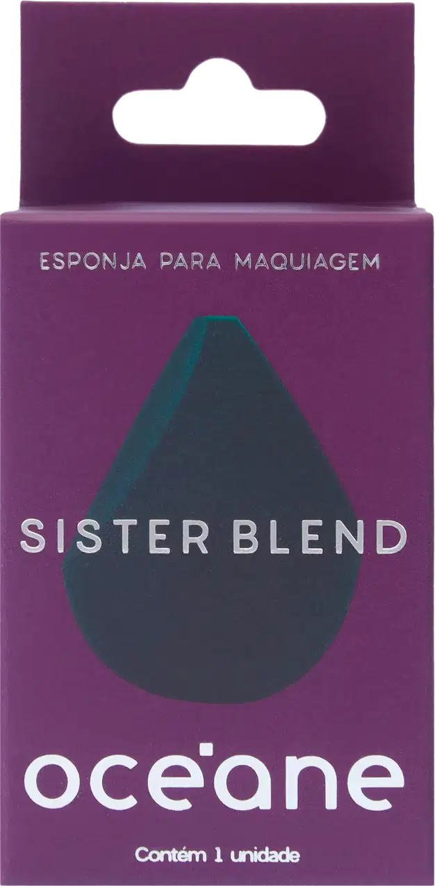 Embalagem retangular em tons de roxo, com um recorte em formato de gota na parte frontal em preto e azul escuro. Texto "Esponja para Maquiagem" e "Sister Blend" em letras brancas, além do logotipo Océane.