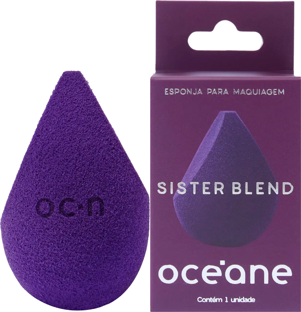Esponja para maquiagem triangular de cor roxa. Ao lado, embalagem retangular roxa com abertura para pendurar, contendo o logotipo "Océane" e a inscrição "Sister Blend" em letras brancas.