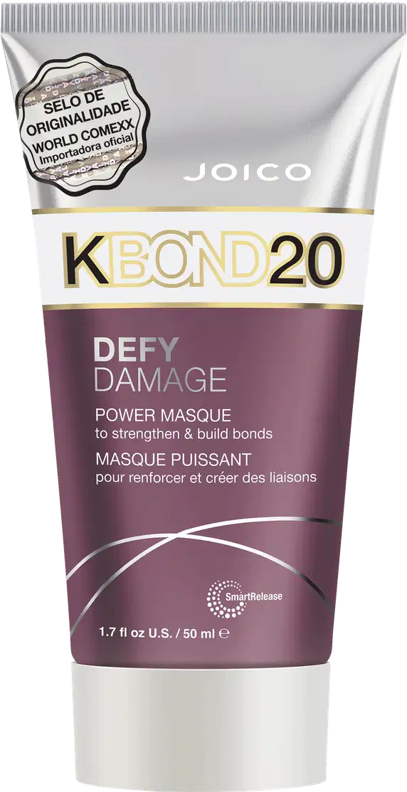 A embalagem é um tubo plástico roxo, branco e prateado com detalhes em dourado. O rótulo frontal apresenta o nome do produto e informações como "para fortalecer e criar ligações".