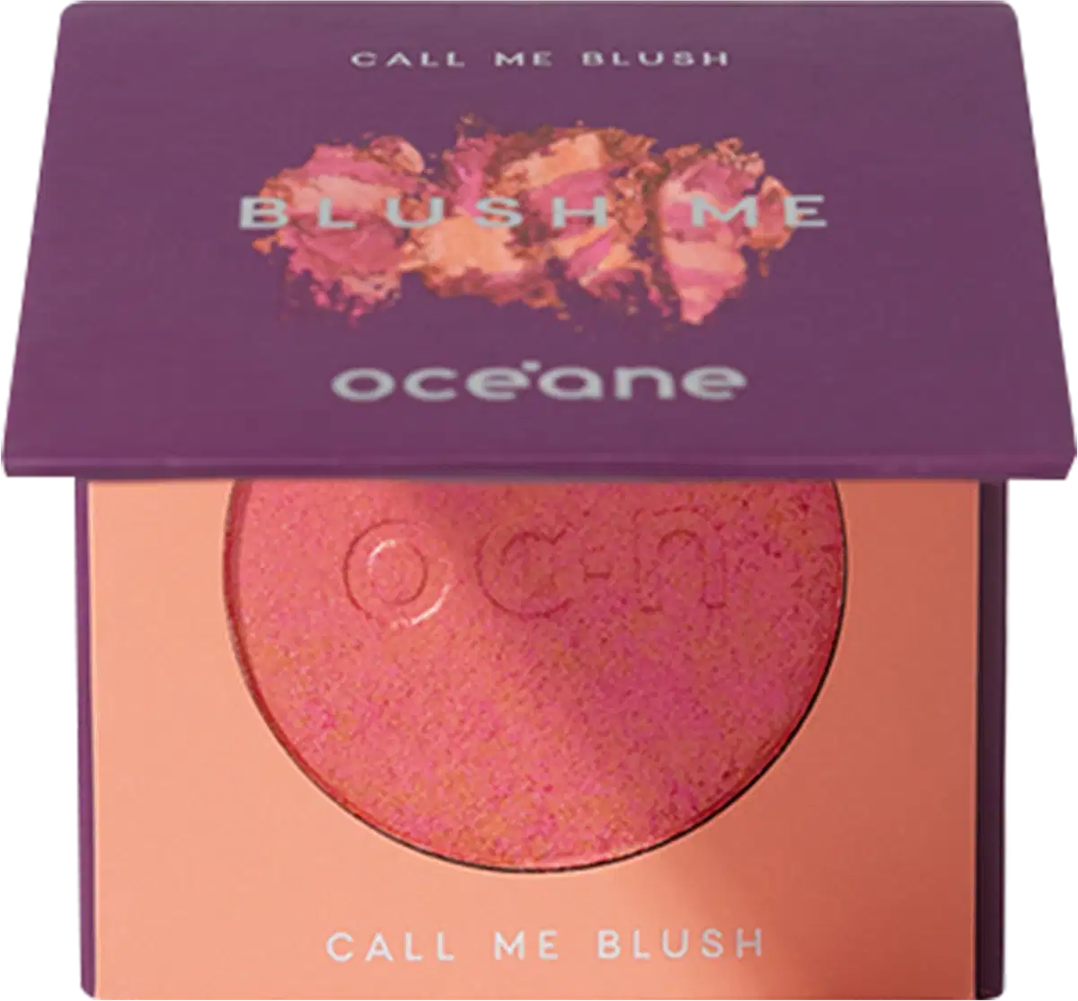 A imagem mostra o produto Blush Me da marca Océane. É uma embalagem quadrada de cor roxa que está semiaberta mostrando a cor do blush em um tom laranja com leve brilho perolado. A parte interna da embalagem é de cor pêssego claro,