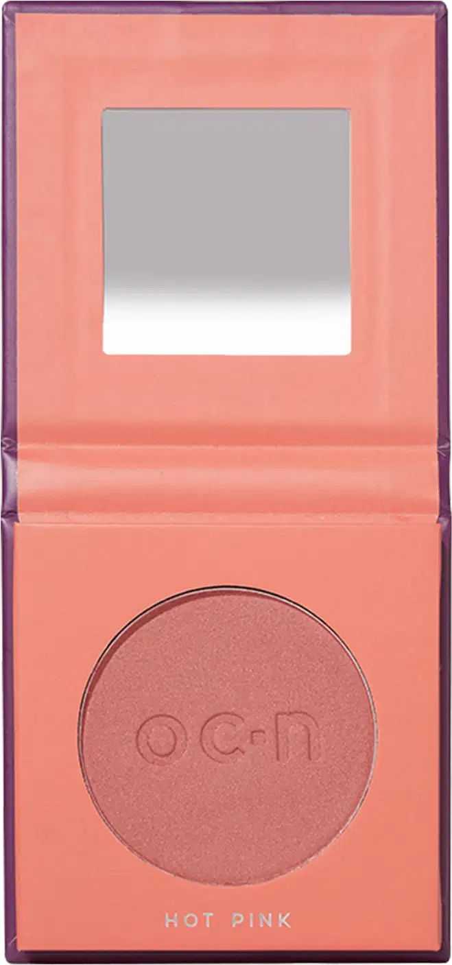 A embalagem está aberta mostrando um espelho na parte superior e o blush compacto em tom de rosa.